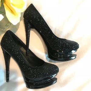 Black platform pumps